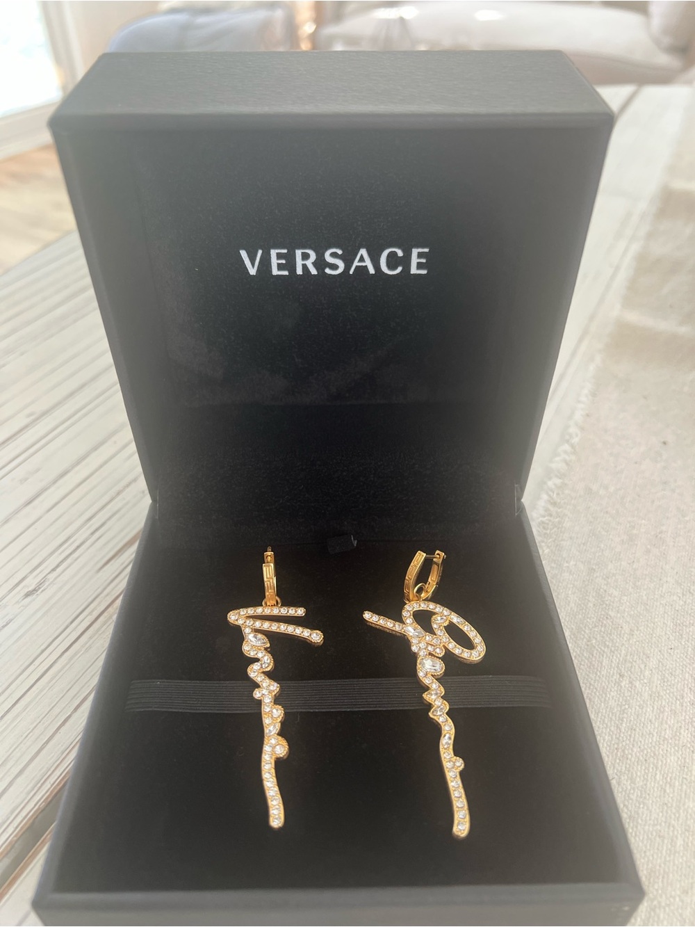 Versace Gold Crystal Letter Drop Earrings - Script 'E' Motif